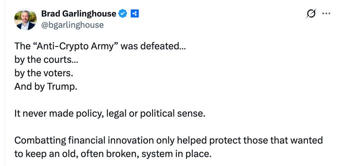 The image features a white background with black text that reads "Just In: #Ripple CEO @bgarlinghouse declares the 'Anti Crypto Army' officially defeated by the courts, the voters, and Donald Trump." The focus of this image is on the message posted by the CEO of Ripple, which highlights the defeat of the Anti-Crypto Army.