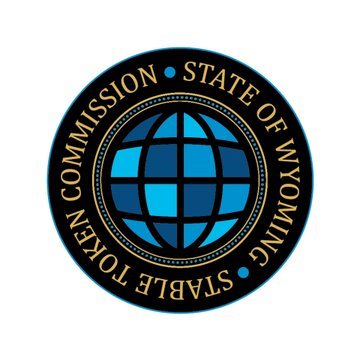 The image shows the official seal of the "Stable Token Commission • State of Wyoming," featuring a stylized blue globe design. This seal represents the commission that made the recent decision to transition the Frontier Stable Token's cross-chain infrastructure from LayerZero to Chainlink's CCIP under a multi-year contract.