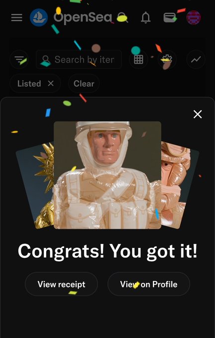 A screenshot of the OpenSea app showing a celebration pop-up with confetti that reads "Congrats! You got it!" featuring an image of a figurine in a white hooded outfit, with buttons to "View receipt" or "View on Profile."