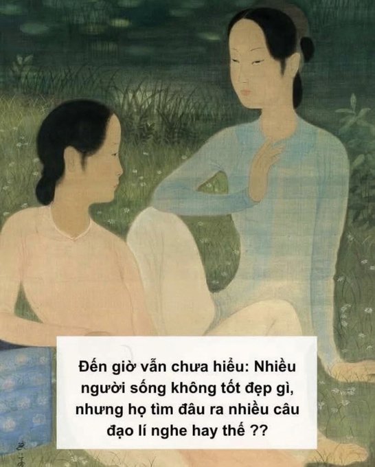 The image features two women sitting together, with one woman wearing a pink shirt and the other wearing blue. They are both facing each other, engaged in conversation or possibly admiring something nearby. The background of the image includes grass and flowers, adding to the overall atmosphere of the scene. The post that accompanies this image is titled "Chào buổi sáng anh em Cứ active, tương tác và duy trì sự hiện diện của mình. Châm thôi". The post seems to be a description or explanation of the image, possibly providing context about the scene depicted in the picture.