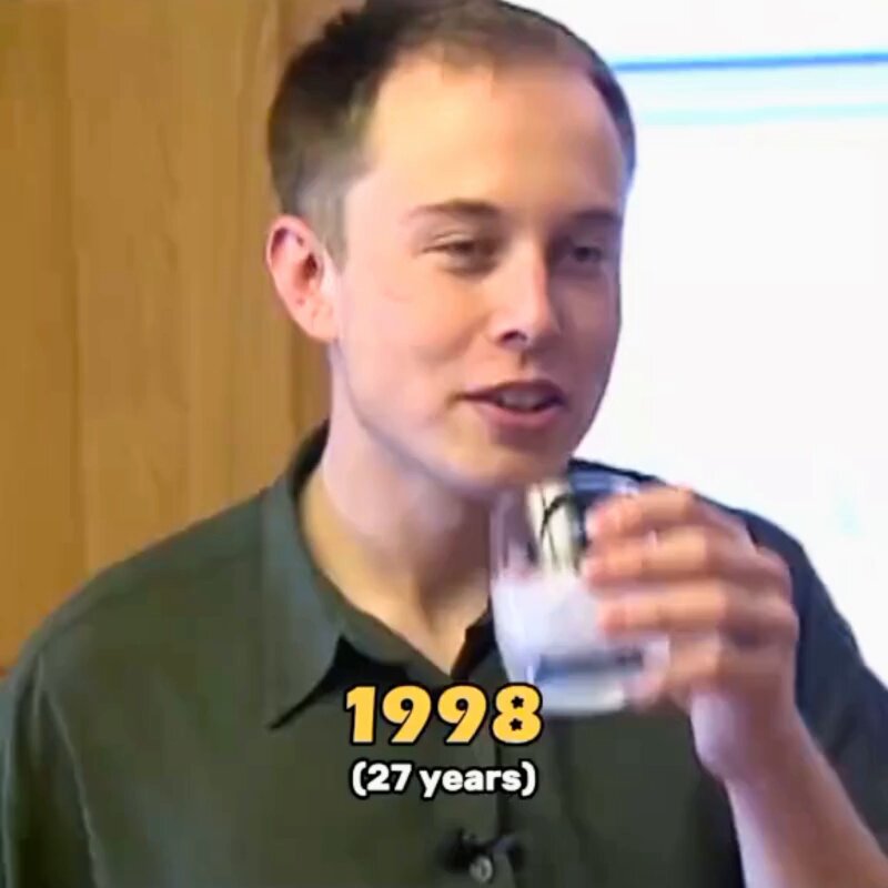 The image features a man holding a glass filled with water while looking at someone else. The caption below the image reads "guys, remember if you work hard, your hair will grow back out of respect also, you may become a trillionaire this may or may not happen to $SPCX holders". This post seems to be promoting an idea about the importance of hard work and dedication in achieving success.