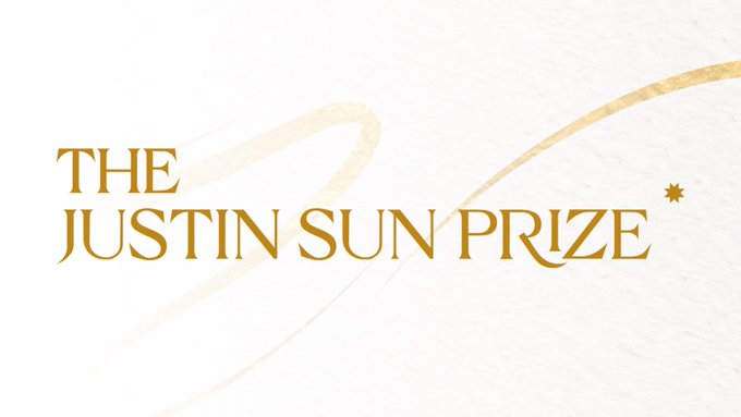 An elegant logo for "The Justin Sun Prize" displayed in gold serif lettering on a textured cream background, featuring sweeping curved lines and a small star accent. The image serves as the official branding for the Sun Yuchen Award mentioned in the post, which celebrates mathematical breakthroughs and honors prize winners.