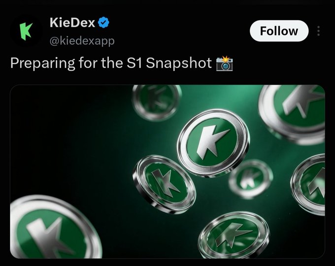 A social media post from verified account @kiedexapp reads "Preparing for the S1 Snapshot📸" above an image of floating 3D green and silver coins bearing a lightning bolt "K" logo, visually representing the upcoming Season 1 snapshot event for the KieDex platform.