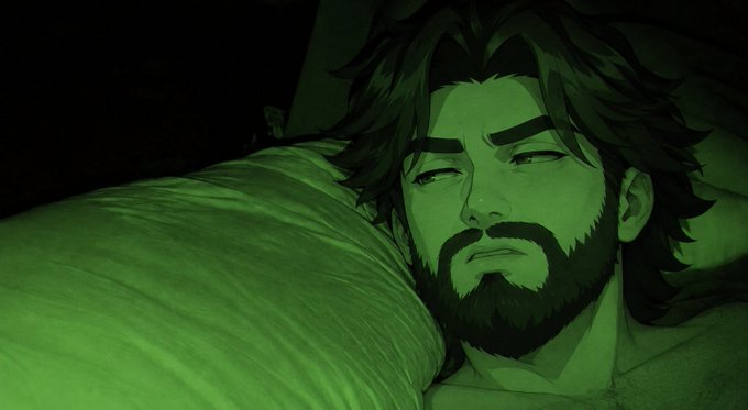 A digitally illustrated scene with a green night-vision tint showing a bearded man with dark hair resting against a pillow with a somber expression.