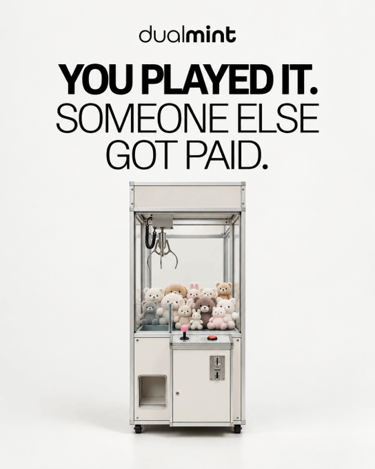 An advertisement for 'dualmint' displays the text 'YOU PLAYED IT. SOMEONE ELSE GOT PAID.' above an image of a claw machine filled with plush toys.