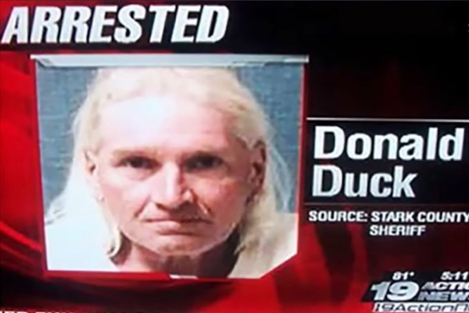 A news broadcast from 19 Action News showing an arrest mugshot with the name 'Donald Duck' and source listed as Stark County Sheriff.