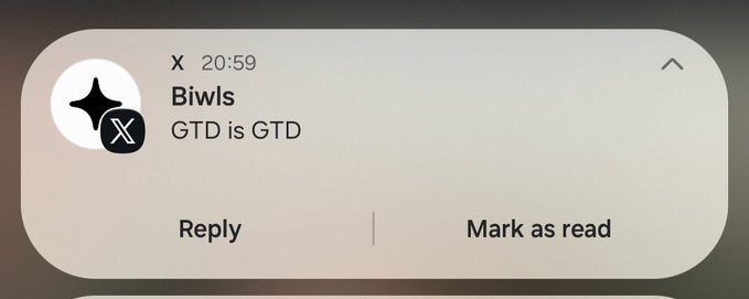 A smartphone notification from X (formerly Twitter) showing a message from 'Biwls' that reads 'GTD is GTD' with options to 'Reply' or 'Mark as read'.