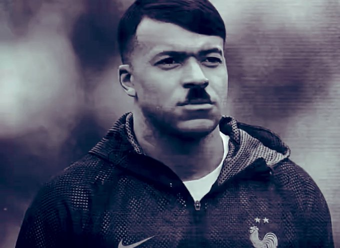 A stylized portrait of a soccer player wearing a Nike jacket with the French national team rooster emblem and two stars.