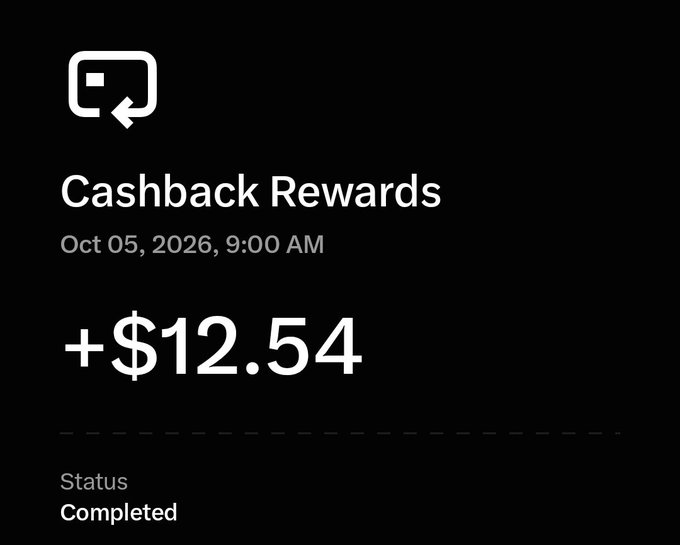 A dark-themed digital notification showing "Cashback Rewards" for "+$12.54" dated "Oct 05, 2026, 9:00 AM" with a "Completed" status.