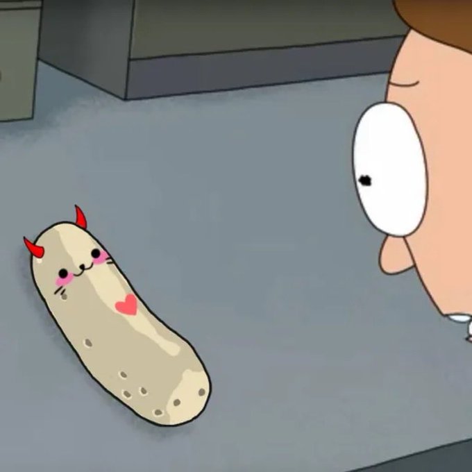 A cartoon character with a devil-faced pickle (with horns and a heart tattoo) sits on the floor, which fits the post's ominous tone of "I found something I shouldn't have." The whimsical yet sinister-looking food item appears to be the "something" the poster discovered.