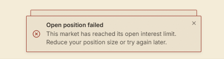 Single error notification popup stating 'Open position failed - This market has reached its open interest limit. Reduce your position size or try again later.'
