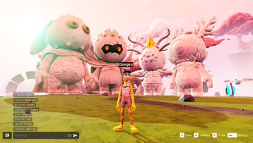 The image shows a group of pinkish-pink robots standing together in front of a screen displaying a game menu. The robots are positioned at various angles, with some facing towards the camera while others have their backs turned. A person can be seen standing next to one of the robots on the right side of the image. The background features a sky filled with clouds and a grassy field extending into the distance. The post reads: "Can you see what the homies over at @OtherGamesXYZ are cooking in the @OthersideMeta with vibecoding, mml and the odk? get in here and start cooking your own builds."