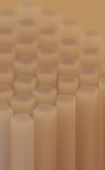 A macro shot of a computer keyboard showing the close-up details of the pale, cream-colored keycaps with shallow depth of field.