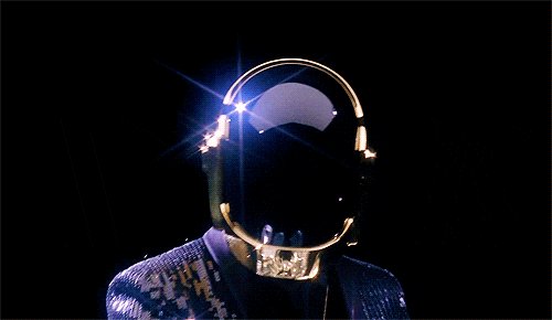 urn of gold and blue light illuminates a person's face, creating a surreal and ethereal atmosphere.