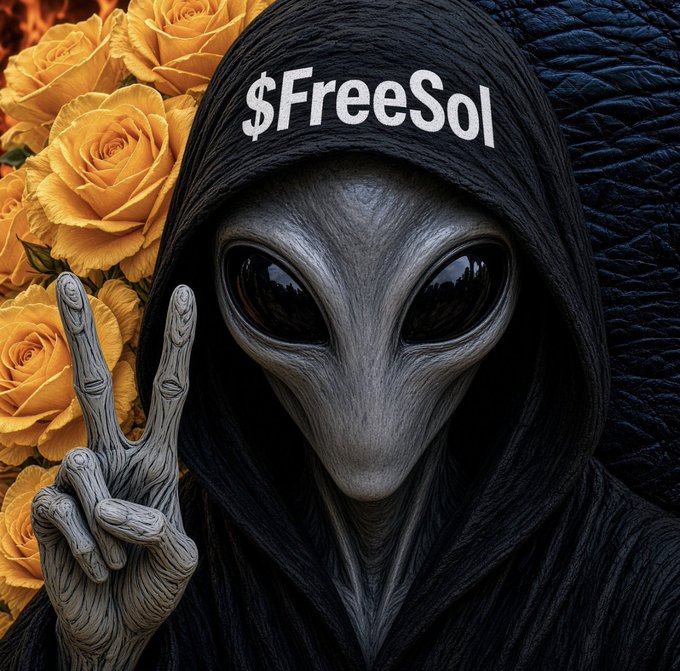 An alien figure in a black hood with '$FreeSol' written across the forehead makes a peace sign, surrounded by yellow roses.
