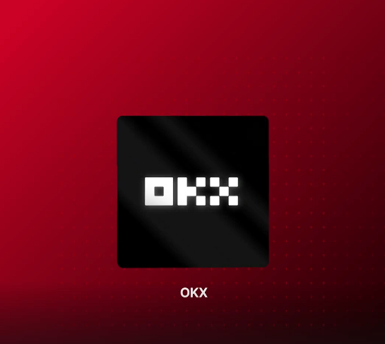 The image features a square logo with a black background and white text that reads "OKX" in bold. The logo appears to be located at the center of the frame, surrounded by small dots arranged in a circular pattern around it. In addition to the logo, there are other words displayed on the right side of the image: "Tron tiếp tục mở rộng hệ sinh thân khi xuất hiện trong thông báo tích hợp mới cùng nhiều đâng chú ý nhất là OKX Europe đã ra mắt TRXUSD Expiry Perpetuals". The overall layout and surrounding text suggest that the image is promoting a product or service related to video games, as it features a video game logo.