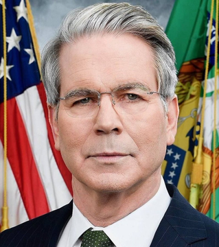 This official portrait features Jerome Powell, Chair of the Federal Reserve, identifiable by his characteristic silver hair, glasses, and formal attire, posed before an American flag and the Federal Reserve seal. The image relates to the post about market performance heading into midterms, as Powell leads the Federal Reserve—the central institution whose monetary policy decisions significantly influence stock market movements.