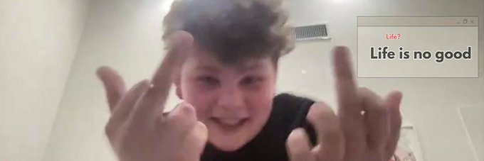 A young person with curly hair smiles and makes double middle finger gestures toward the camera, while an overlaid browser search box displays the query "Life?" with the auto-complete suggestion "Life is no good," playfully clashing with the cheerful "GM" greeting meant to wish the community a good morning.