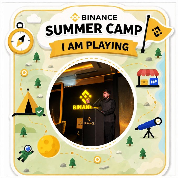 A promotional badge for "Binance Summer Camp - I AM PLAYING," featuring a photo of a bearded man speaking at a Binance podium surrounded by a map illustration with tents, trees, and a telescope.
