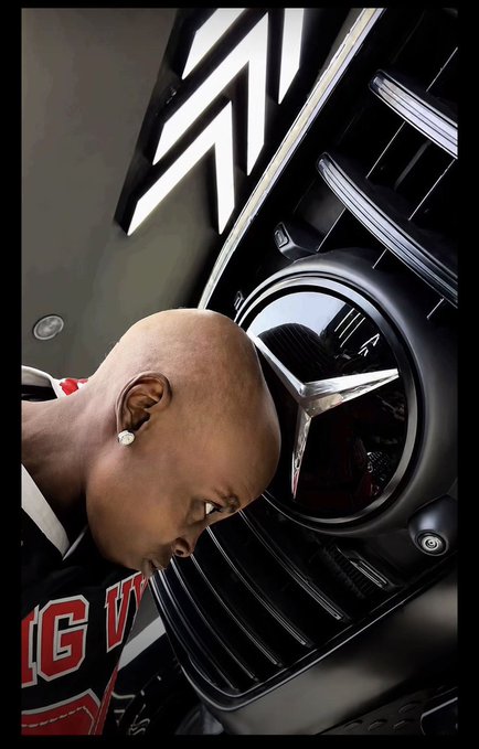 A young boy in a red and black jersey poses beside a close-up Mercedes-Benz emblem, with the iconic three-pointed star and circular logo prominently displayed, reflecting a luxurious, aspirational energy that complements the post's bullish, stay-positive mindset from "GM CT."