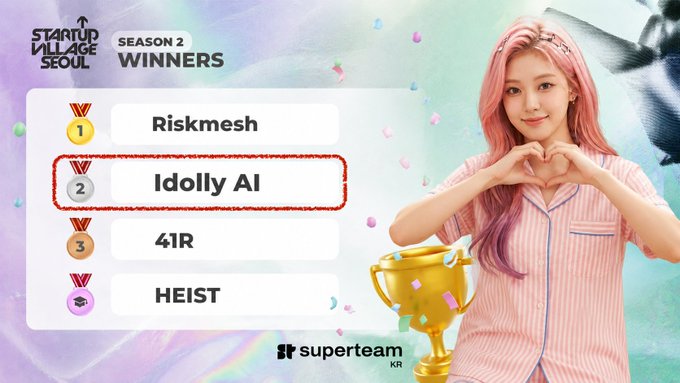 The image features a girl with pink hair wearing a pink pajama top standing next to a gold trophy, which has the text "Idolly AI" written on it. The girl appears to be posing for a picture while holding the trophy. The background of the image is filled with confetti and stars, suggesting that this event might have been a celebration or a special occasion.