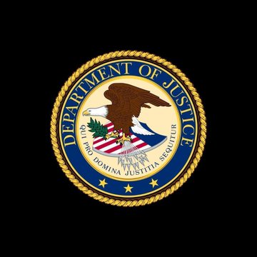 The image displays the official seal of the U.S. Department of Justice, featuring a bald eagle, the text "DEPARTMENT OF JUSTICE," and the Latin motto "QUI PRO DOMINA JUSTITIA SEQUITUR," which connects to the post about the DOJ investigating Andreessen Horowitz.