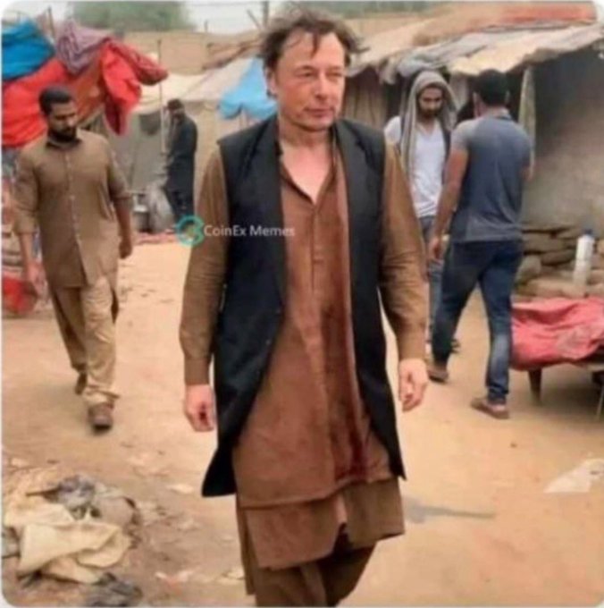 A digitally altered image shows Elon Musk wearing traditional South Asian clothing (a shalwar kameez and black vest) walking through a dirt-path village setting, watermarked with 'CoinEx Memes'.