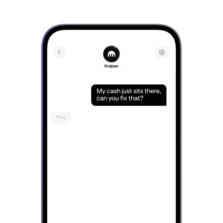 A smartphone displays a chat interface with "Kraken" at the top, where a user has typed "My cash just sits there, can you fix that?"—with Kraken's typing indicator shown, illustrating the new AI-powered portfolio assistant being promoted.
