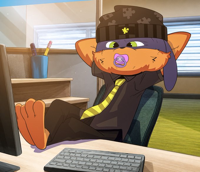 The image shows a cartoon orange cat character dressed in a business suit with a yellow-striped tie, a military-style cap, and a purple pacifier, lounging with its bare feet propped up on a desk in front of a computer monitor. The character appears to be a furry-style illustration that has no visible text or tickers, but its confident "putting feet up" pose visually aligns with the post's triumphant "DEX PAID ✅" announcement and "we're just getting started" attitude.