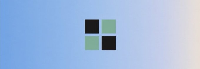 A simple graphic showing a 2x2 grid of squares (alternating black and green) centered on a blue gradient background.
