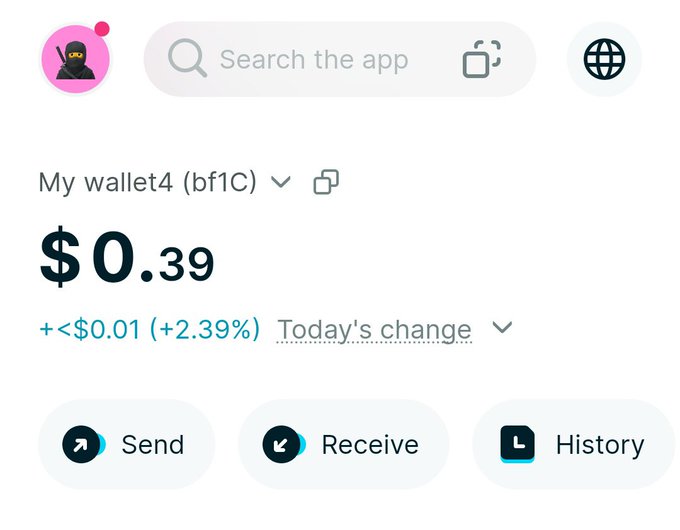 A crypto wallet app interface showing a balance of $0.39 with a +2.39% daily change, with options for Send, Receive, and History.
