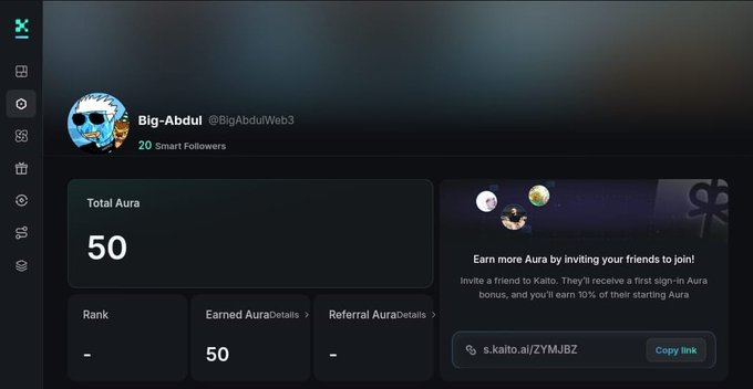 A user profile on Kaito showing the handle "Big-Abdul" (@BigAbdulWeb3) with 20 Smart Followers and a Total Aura score of 50, displayed alongside a referral link (s.kaito.ai/ZYMJBZ) promoting free sign-in Aura bonuses. The image directly supports the post's message about the user's 50 aura points on Kaito and encourages others to check their own scores using the shared referral link to earn free crypto rewards.