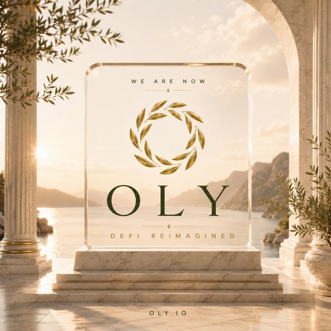 The image displays an elegant, golden promotional graphic for the "OLY" DeFi project (oly.io), featuring a laurel wreath emblem and the tagline "WE ARE NOW OLY: DEFI REIMAGINED" set against a classical Mediterranean backdrop with marble columns and olive branches.

This opulent visual reinforces the accompanying post's message about OLY reimagining DeFi—presenting the project not as a typical token launch, but as a refined, heritage-inspired system designed for sophistication and long-term value, mirroring the classical aesthetic that suggests timeless craftsmanship in financial infrastructure.