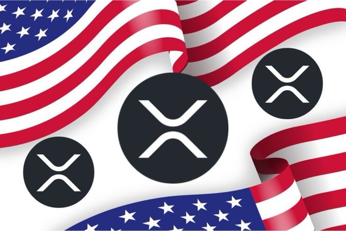 The image features a flag with three circles, each containing an X, surrounded by red, white, and blue stripes representing the American flag. The text "BREAKING: The US Government May Seize Ripple's $XRP Escrow for National Reserve Use." is displayed in the corner of the image. This suggests that there might be some news or development related to Ripple cryptocurrency that has caught the attention of the government.