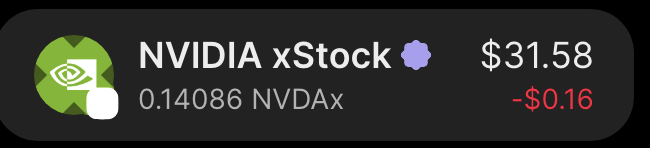 A widget showing NVIDIA xStock (NVDAx) at $31.58, down $0.16, with a green NVIDIA logo.