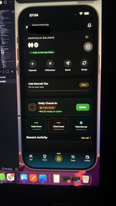 The image shows a cell phone screen displaying various app icons, including one for "The Marsverse" app. The text on the screen reads "Day 12 @The_Marsverse app is coming alive! Soon on AppleStore and PlayStore powered by $MARS". This suggests that the post is related to an upcoming release of the app or a review about its features.