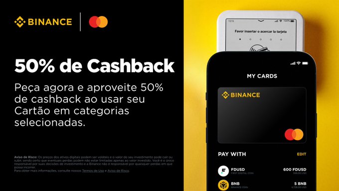 The image shows a promotional banner for Binance Card, with an iPhone placed on top of it. The iPhone displays a Cashback application that allows users to claim their cashback. The banner emphasizes a 50% cashback offer and provides a link to apply for the card. It also mentions that you can already receive up to 50% in USDT (United States Dollar).