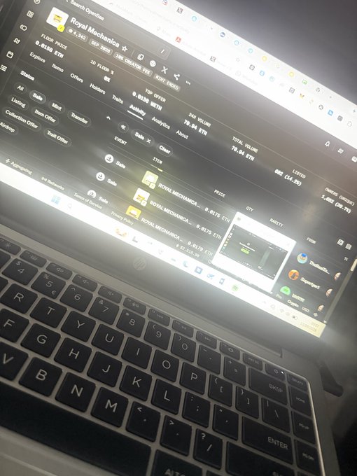 A laptop screen displays a stock trading platform with "Royal Mechanica" (ticker $MECH) highlighted among portfolio holdings, visually reinforcing the poster's bullish sentiment about holding their rare $MECH tokens.