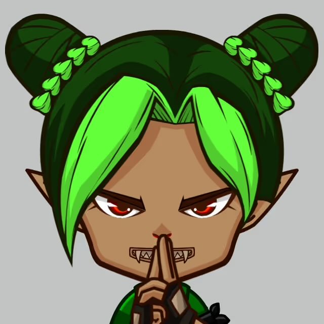 An illustrated chibi-style character with dark skin, green twin buns adorned with heart decorations, bright green bangs, red eyes, pointed elf-like ears, and a mischievous grin showing small fangs, holding a finger to her lips.