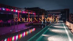 The image showcases an elegant evening poolside event with the illuminated "GOLDEN STRIPE" sign reflected on the water, featuring ambient lighting that sets a sophisticated nightlife atmosphere—fitting for a post expressing FOMO about not attending Token2049 in person.