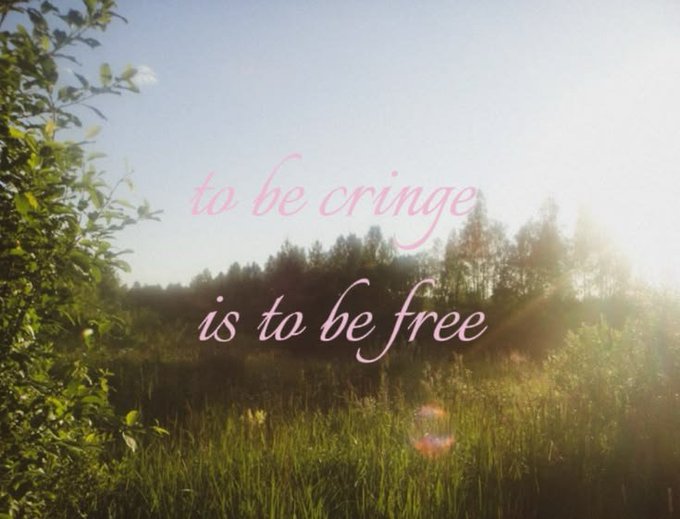 A photograph of a sunlit grassy field with trees, overlaid with pink cursive text reading 'to be cringe is to be free'.