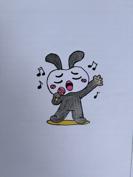 A hand-drawn colored pencil sketch on lined paper of a black and white bunny-like character singing into a microphone with musical notes floating around.