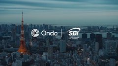 A dark, blue-toned cityscape of Tokyo featuring the illuminated Tokyo Tower, overlaid with the white "Ondo" logo (accompanied by a circular emblem) and the "SBI Liquidity" logo, visually reinforcing the announcement of the SBI and Ondo Finance partnership.