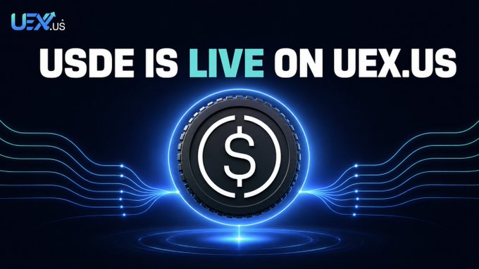 A promotional graphic announcing "USDE IS LIVE ON UEX.US" featuring a large central dollar sign coin with glowing blue circuitry on a dark background.