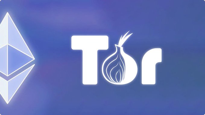 The image features a blue background with white text, which reads "Tor" followed by an onion logo. The onion logo consists of a white onion cut into two layers, with the top layer being larger than the bottom one. The image also includes a small triangle in the upper left corner and a smaller triangle at the bottom right corner.