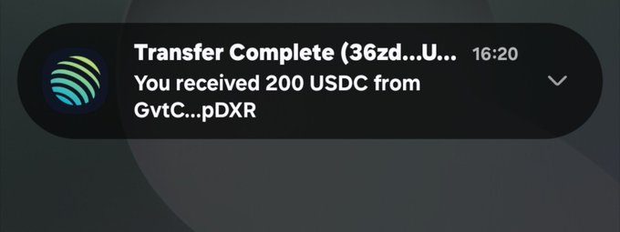 A smartphone notification displaying "Transfer Complete (36zd...U... 16:20) You received 200 USDC from GvtC...pDXR," indicating a confirmed cryptocurrency transaction. The notification complements the post about productivity ("lessers tweets this month, time to get jobs done") by symbolically showcasing completed work and tangible results in the form of received USDC funds.