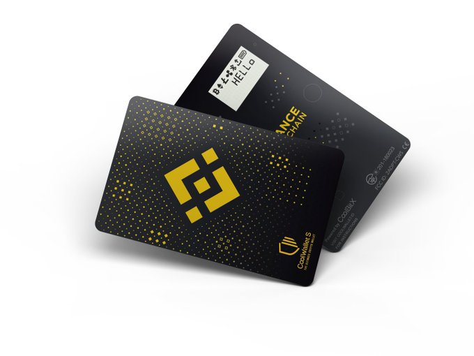 A product image showing two black cold storage wallet cards from CoinWallet.S featuring a QR code pattern in yellow and labels for 'Binance', 'CoinMonet', and 'Binance Smart Chain'.