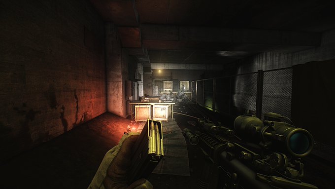 A first-person view of a player wielding a sniper rifle and pistol in a dark, gritty industrial corridor. The atmospheric scene reflects the tense, stealthy environment teased by the upcoming Lighthouse update announcement.