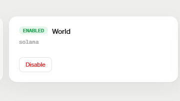 A user interface panel showing 'ENABLED' status for 'World' on 'solana' with a 'Disable' button.