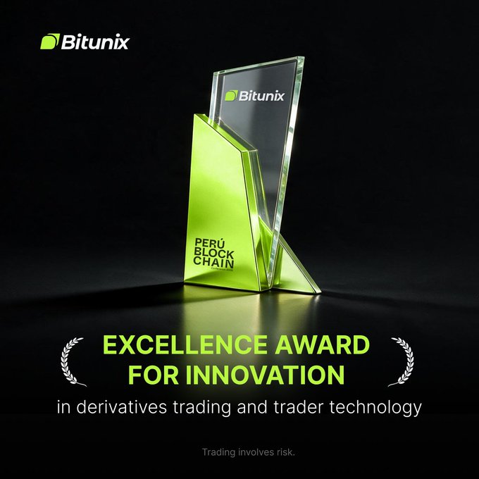Bitunix's glass trophy from Perú Blockchain 2026 prominently displays "Bitunix" branding, an "Excellence Award for Innovation in Derivatives Trading and Trader Technology" banner with laurel wreaths, and a "Trading involves risk" disclaimer, celebrating the exchange's recognition for innovation in Peru.